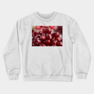 Macro of pomegranate seeds Crewneck Sweatshirt